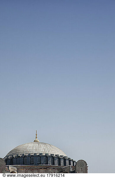 Istanbul  view of a historic building  a dome and a gold colour roof finial.