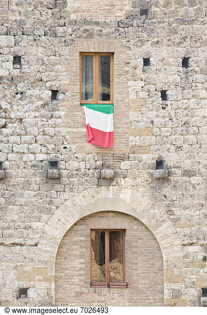 Italian Flag Flying on a Medieval Building