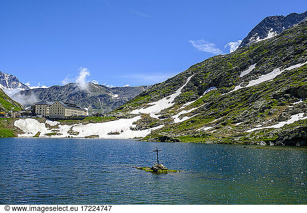 Italy  Aosta Valley  Great Saint Bernard Lake in front of Great Saint Bernard Hospice at Great Saint Bernard Pass