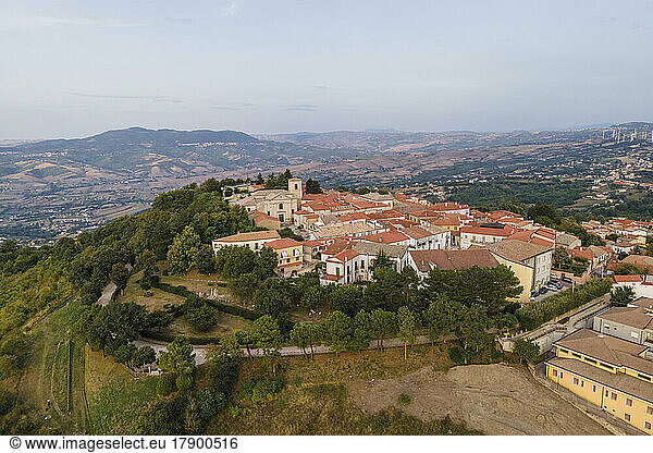 Italy  Campania  Avellino  Aerial view of hilltop town with thick fog floating in background