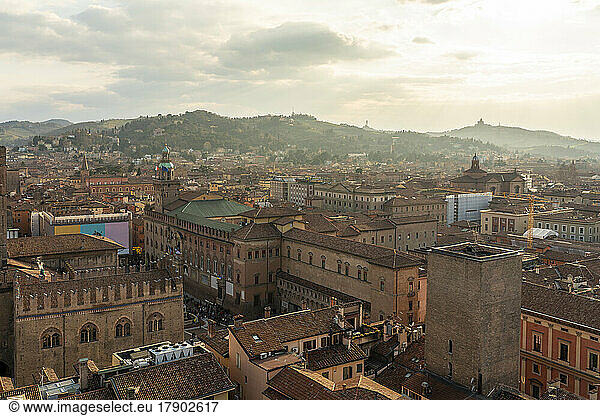Italy  Emilia-Romagna  Bologna  Buildings surrounding historic Piazza Maggiore square at sunset