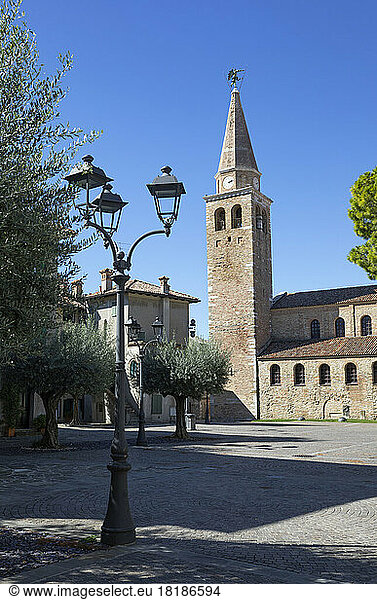 Italy  Friuli Venezia Giulia  Grado  Empty town square with Basilica of Sant Eufemia in background