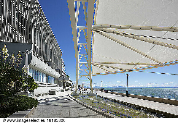 Italy  Friuli Venezia Giulia  Grado  Modern canopy over beach promenade
