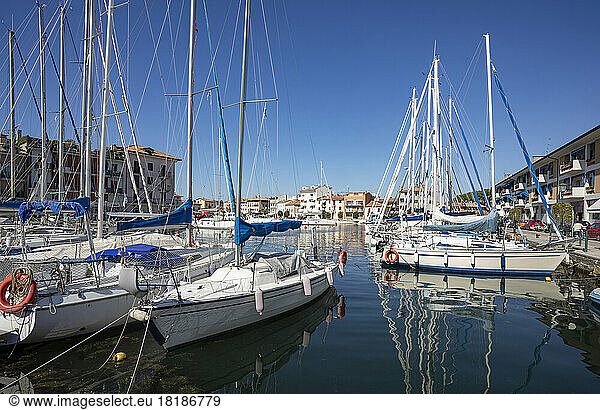 Italy  Friuli Venezia Giulia  Grado  Sailboats moored in Porto Mandracchio marina