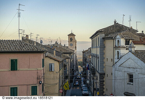 Italy  Lazio  Caprarola  Town street surrounded by houses at dusk