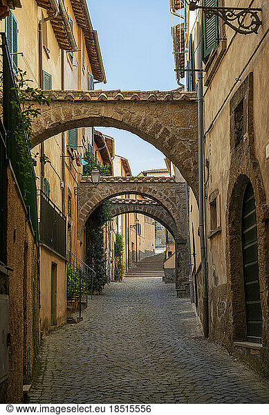 Italy  Lazio  Tuscania  Arches over empty alley
