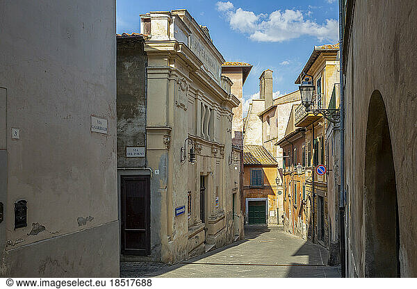 Italy  Lazio  Tuscania  Empty alley stretching between historic houses