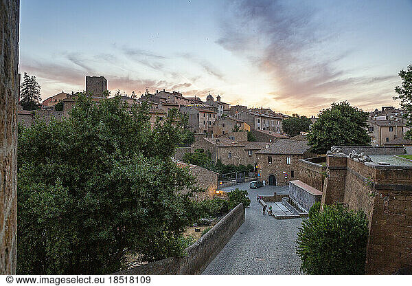 Italy  Lazio  Tuscania  View of medieval town at dusk