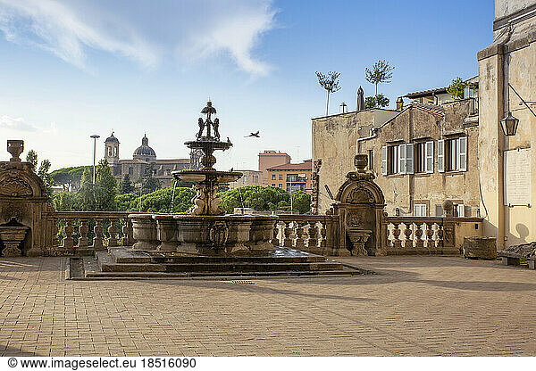 Italy  Lazio  Viterbo  Fountain and terrace of Palazzo dei Priori with Chiesa della Santissima Trinita church in background