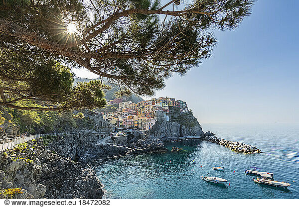 Italy  Liguria  Manarola  Sun shining over historic village along Cinque Terre