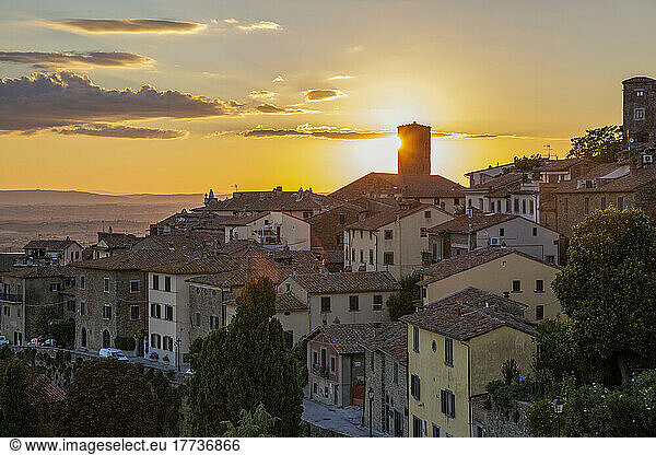 Italy  Province of Arezzo  Cortona  View of old town houses at sunset