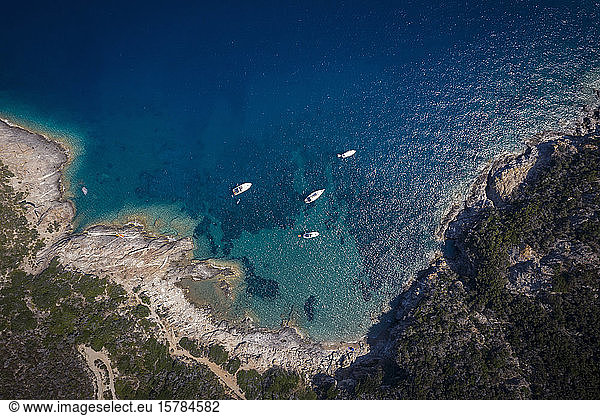 Italy  Province of Livorno  Elba  Aerial view of boats floating in blue coastal water
