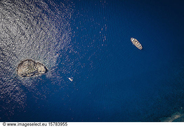 Italy  Province of Livorno  Elba  Aerial view of boats floating in blue waters of Mediterranean Sea