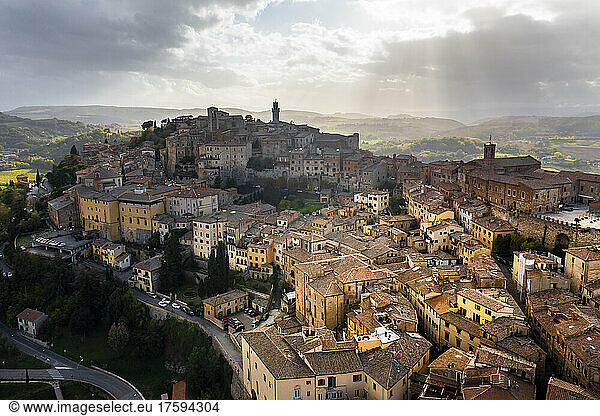 Italy  Province of Siena  Montepulciano  Helicopter view of medieval hill town in Val dOrcia at cloudy day