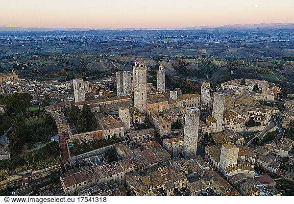 Italy  Province of Siena  San Gimignano  Drone view of old medieval town at dusk