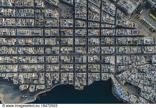 Italy  Puglia  Polignano a Mare  Aerial view of grid pattern of coastal old town