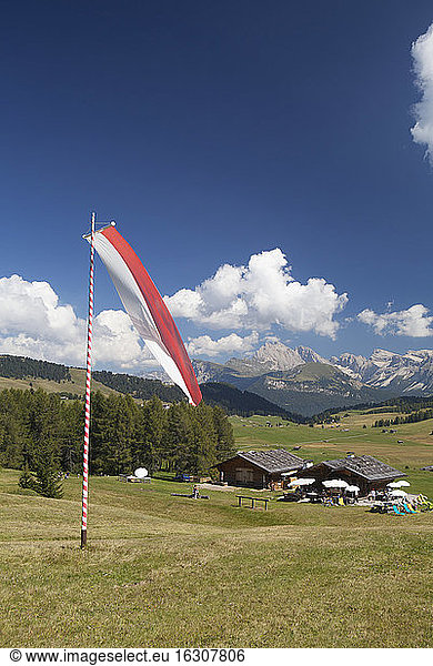 Italy  South Tyrol  Alpine cabin and flag at Seiseralm