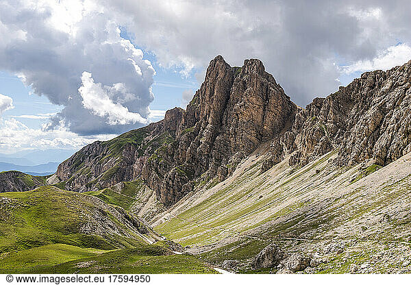 Italy  South Tyrol  Clouds over mountainous landscape of Schlern-Rosengarten Nature Park in summer