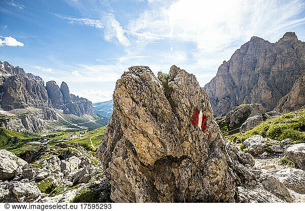 Italy  South Tyrol  Hiking trail mark painted on boulder in Sella Group