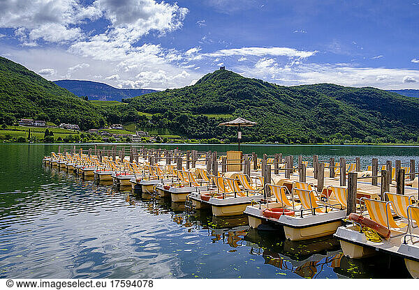 Italy  South Tyrol  Rental pedal boats on shore of Lake Kaltern