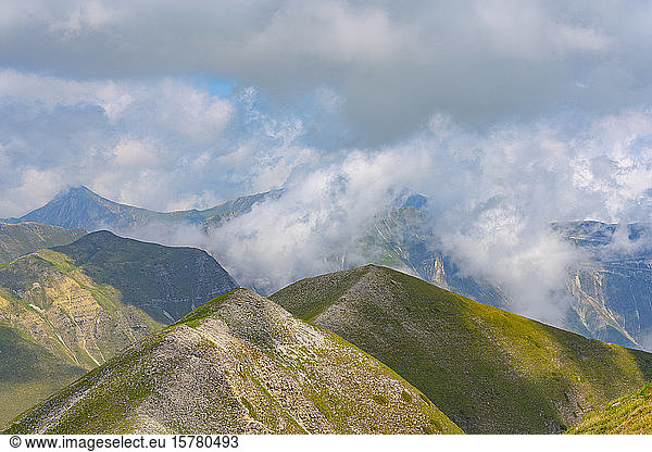 Italy  Umbria  Sibillini mountain range  Mount Vettore covered with clouds
