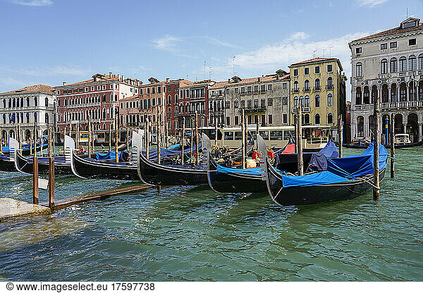 Italy  Veneto  Venice  Gondolas moored along city canal