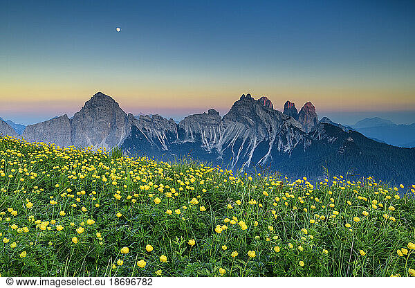 Italy  Veneto  View from Monte Rite at dusk with meadow in foreground