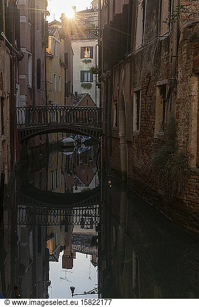 Italy  Venice  Bridge over Venetian canal at sunset