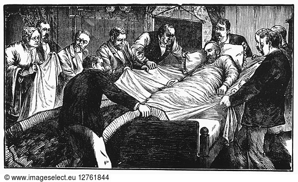 JAMES A. GARFIELD (1831-1881). 20th President of the United States. The wounded President being moved after being shot on 2 July 1881. Late 19th century wood engraving.