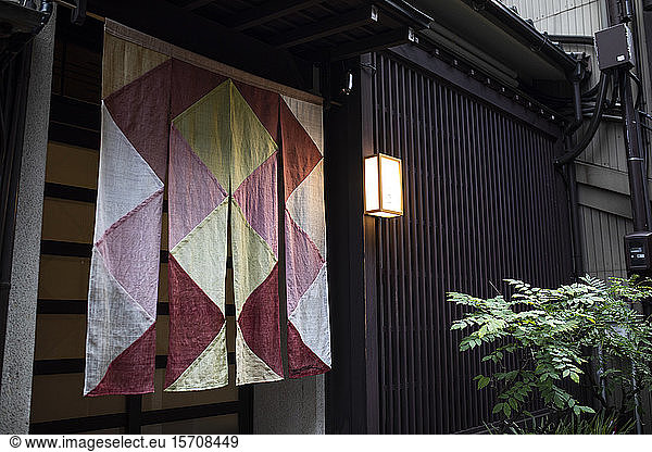 Japan  Ishikawa Prefecture  Kanazawa  Decorative fabric hanging in front of house