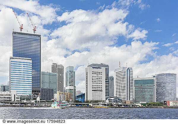 Japan  Kanto Region  Tokyo  Clouds over waterfront skyscrapers