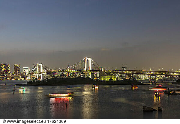 Japan  Kanto Region  Tokyo  Long exposure of Tokyo Bay at dusk with Rainbow Bridge in background