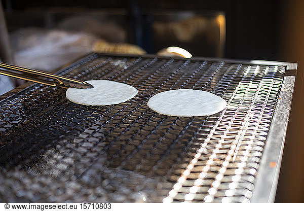 Japan  Takayama  Japanese food being prepared on grill
