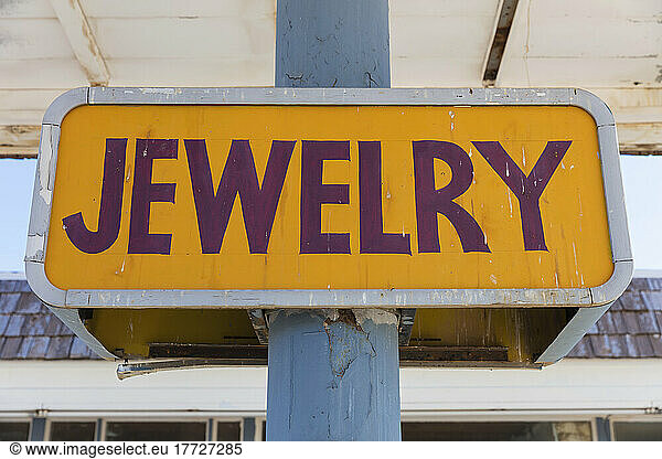 JEWELRY sign at abandoned tourist rest stop shop.