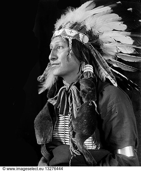 Joe Black Fox by Photographer Gertrude Kasebier  1852-1934. Sioux Indian from Buffalo Bill"s Wild West Show. Joe Black Fox  half-length portrait  seated  facing left. Dated ca. 1900
