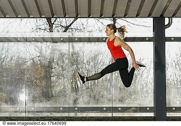 Jumping  woman doing fitness training  Schorndorf  Baden-Württemberg  Germany  Europe