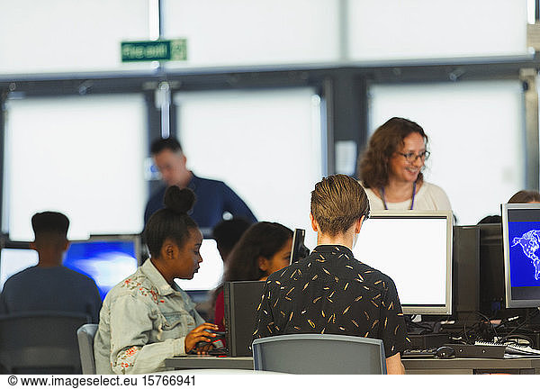 Junior high students using computers in computer lab