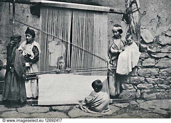 Kabyle weavers and native loom  Northern Algeria  1912. Artist: Legrand.