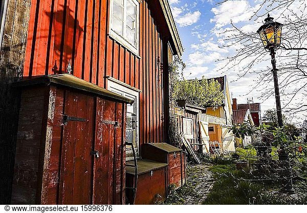 Kalmar  Sweden The grassy backyard to a red wooden house in the old town.