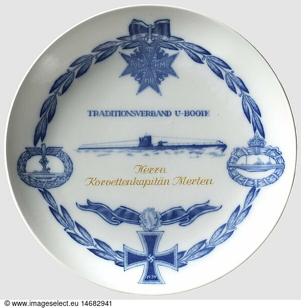 Karl-Friedrich Merten - a Meissen honour plate  from the U-boat Traditions Association on his award of the Knight's Cross on 13 June 1942 White  glazed porcelain with blue decoration. In the centre a depiction of a U-boat above a yellow-gold name inscription 'Herrn Korvettenkapitän Merten'  surrounded by a laurel wreath with the order Pour-le-mérite on top  the U-boat War Badges 1918 and 1939 on the sides  and a Knight's Cross with Oak leaves at the bottom. Meissen crossed swords mark in underglaze blue  press number 'N11Z' and '159' on the back. Diameter 25.5 cm  historic  historical  1930s  20th century  navy  naval forces  military  militaria  branch of service  branches of service  armed forces  armed service  object  objects  stills  clipping  clippings  cut out  cut-out  cut-outs  dishes  dish  plate  plates