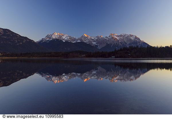 Karwendel Mountains Reflected in Lake Barmsee  Krun  Upper Bavaria  Bavaria  Germany