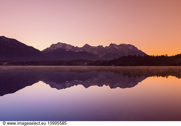Karwendel Mountains Reflected in Lake Barmsee  Krun  Upper Bavaria  Bavaria  Germany