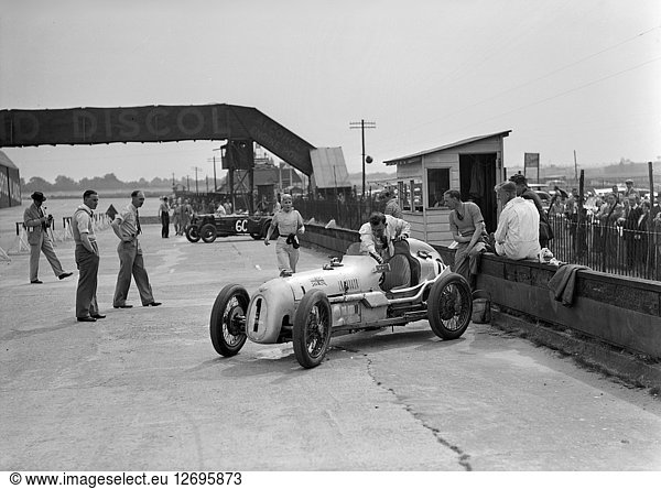 Kay Petre in an Austin 7 works team racing car Brooklands 1937. Artist: Bill Brunell.