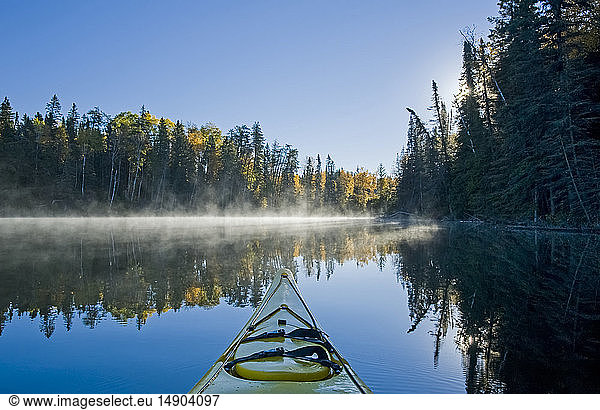 Kayaking at Glad Lake  Duck Mountain Provincial Park; Manitoba  Canada