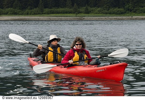 Kayaking in Icy Strait. Glacier Bay National Park adn Preserve. Chichagof Island. Juneau. Southeast Alaska. Today is the ultimate day of exploration. Set your course for arguably the richest whale waters in Southeast Alaska. Keep watch for the telltale blow of the humpbacks as you scour the nutrient-rich waters in search of whales  porpoise  sea lions  and other wildlife. Join the Captain on the bridge or go on deck with your Expedition Leader. Late afternoon  drop the skiffs and kayaks for closer inspection of the remote coastline with eyes set on shore for possible bear sightings. This evening  take in the solitude while relaxing in the upper deck hot tub or enjoy a nightcap with your fellow yachtmates in the saloon.