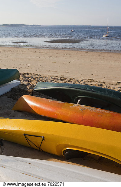 Kayaks on a Sandy Beach