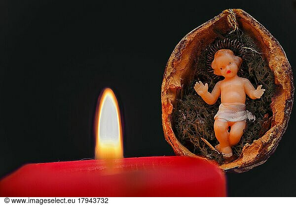Kerze mit Jesus in der Krippe