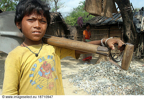 Kids crushing gravel to provide family income in Hetauda  Nepal.