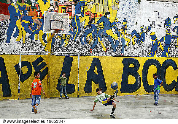 Kids playing soccer in Buenos Aires.