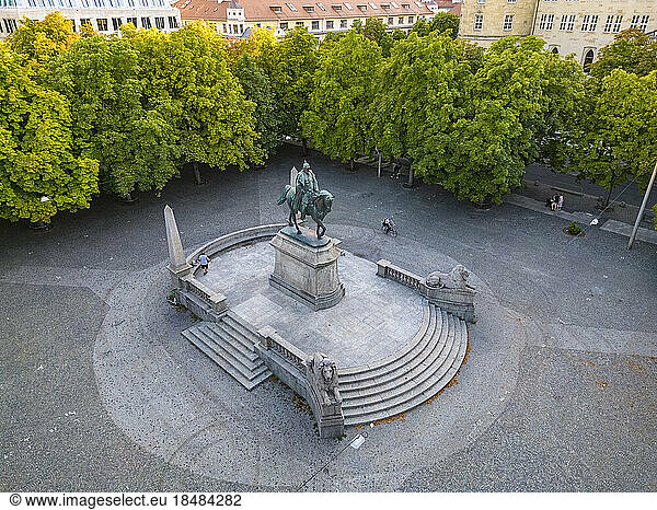 King Karl's memorial statue in front of trees at Karlsplatz Square  Stuttgart  Germany
